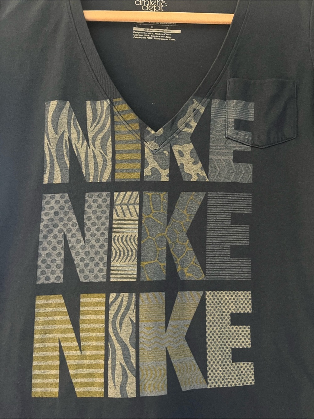Nike Black V-Neck Short Sleeve Tee with Gray and Gold Patterned NIKE Print